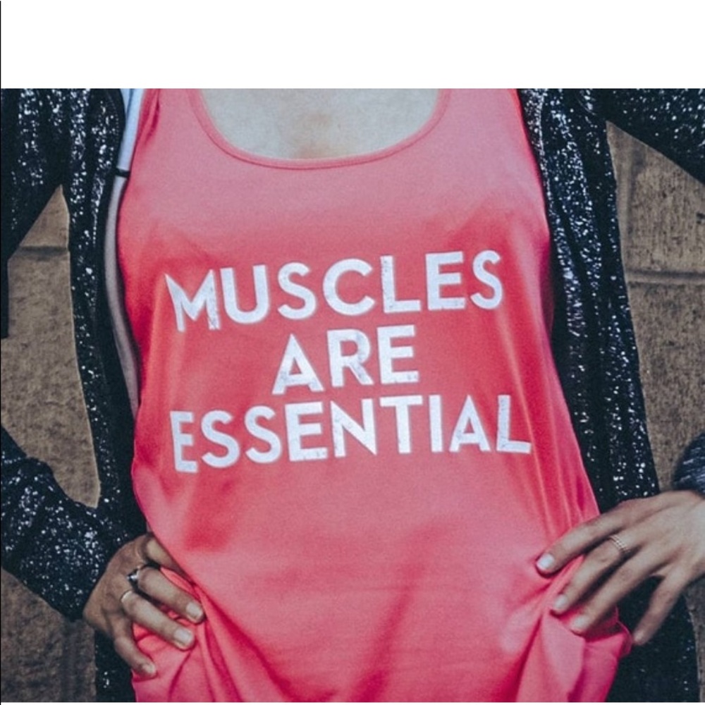 Women sport tank tops. In black and coral. New with tags. Small medium large.